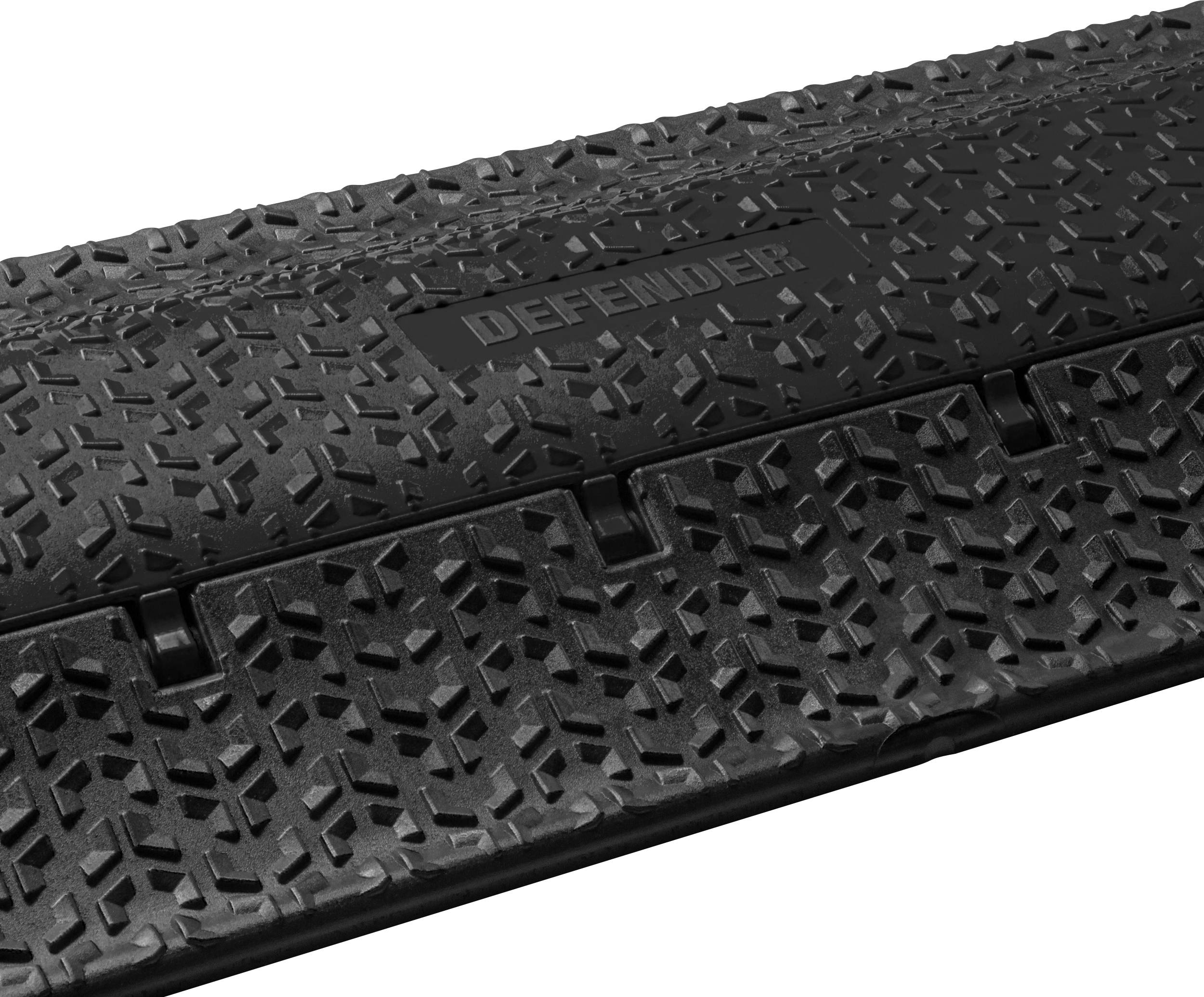 A black cable protector with a non-slip, textured pattern and the inscription 'DEFENDER' in the centre.