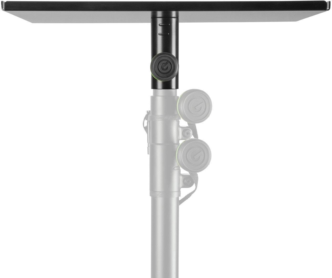 A camera is mounted on a telescopic tripod that is extended upwards.