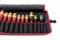 A set of eleven screwdrivers in various sizes, with red and yellow handles, organised in a black fabric case.