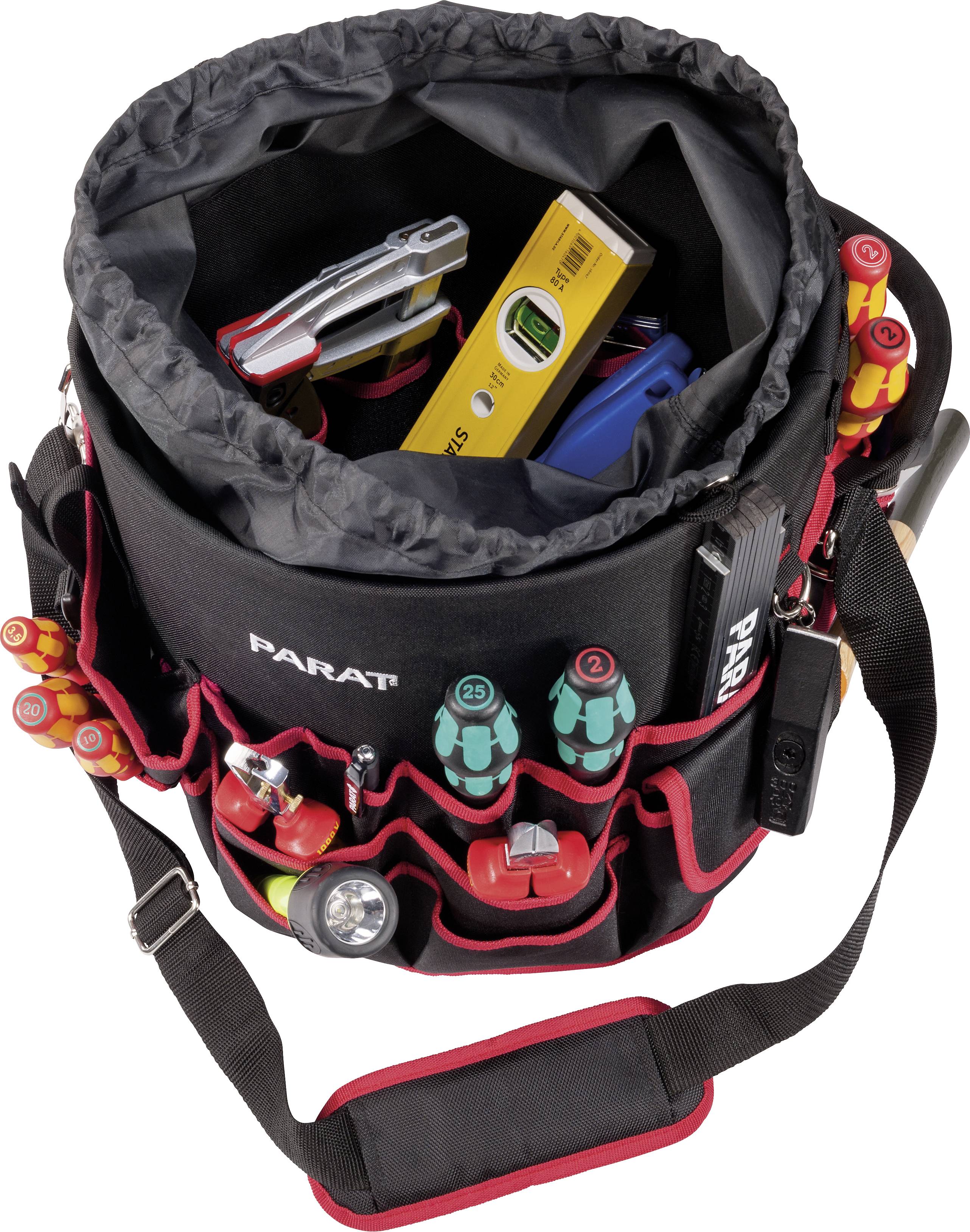 Fabric tool bag with multiple compartments filled with hand tools such as pliers, screwdrivers, spirit level; carry handle and shoulder strap.