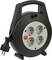 Black cable reel with four outlets and a red switch, suitable for indoor use for power distribution.