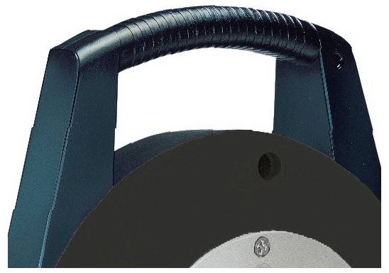 A part of a black handle with a grooved surface, presumably part of a larger device or equipment.