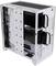 A white computer case, showing the interior view with exposed mounting points for components and cable management.