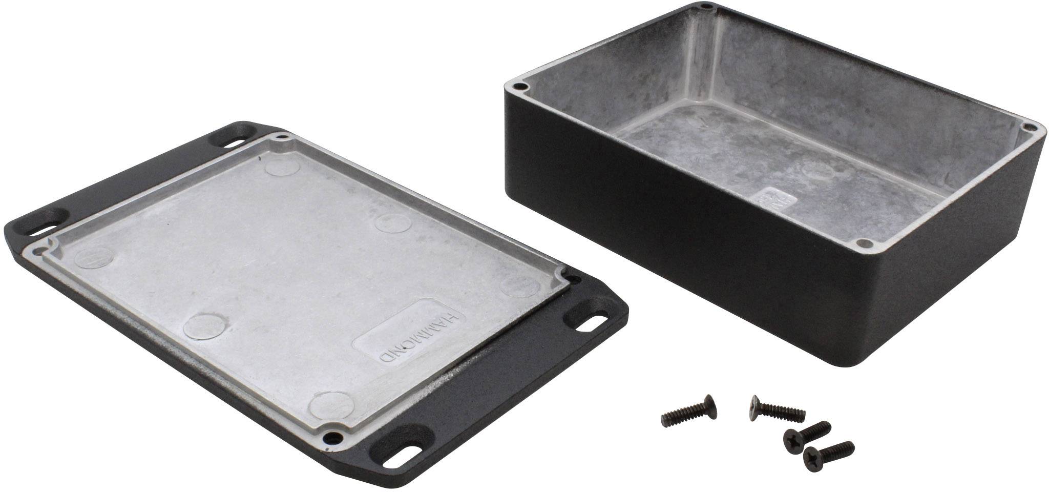 Rectangular, black metal enclosure with its lid removed. Four screws are placed beside it. Suitable for electronic assembly.