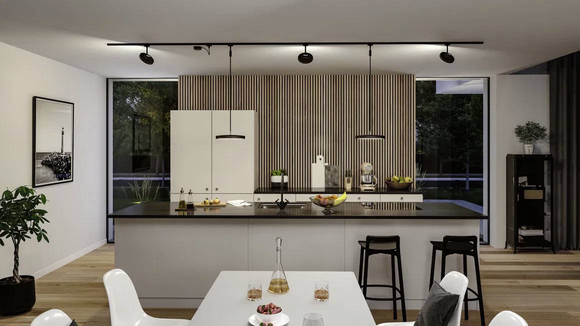 Modern kitchen with a large, black kitchen island, white cabinets and dining area in the foreground. Wooden accents and minimalist decoration.