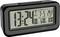 Black digital alarm clock shows 13:24. Display of date, day of the week and temperature. Monday, 7th May, 20.3 degrees Celsius.