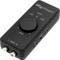 Black audio interface device with rotary knob for level adjustment. Labels: 'LOW', 'OK', 'HIGH', RCA inputs on the front panel.