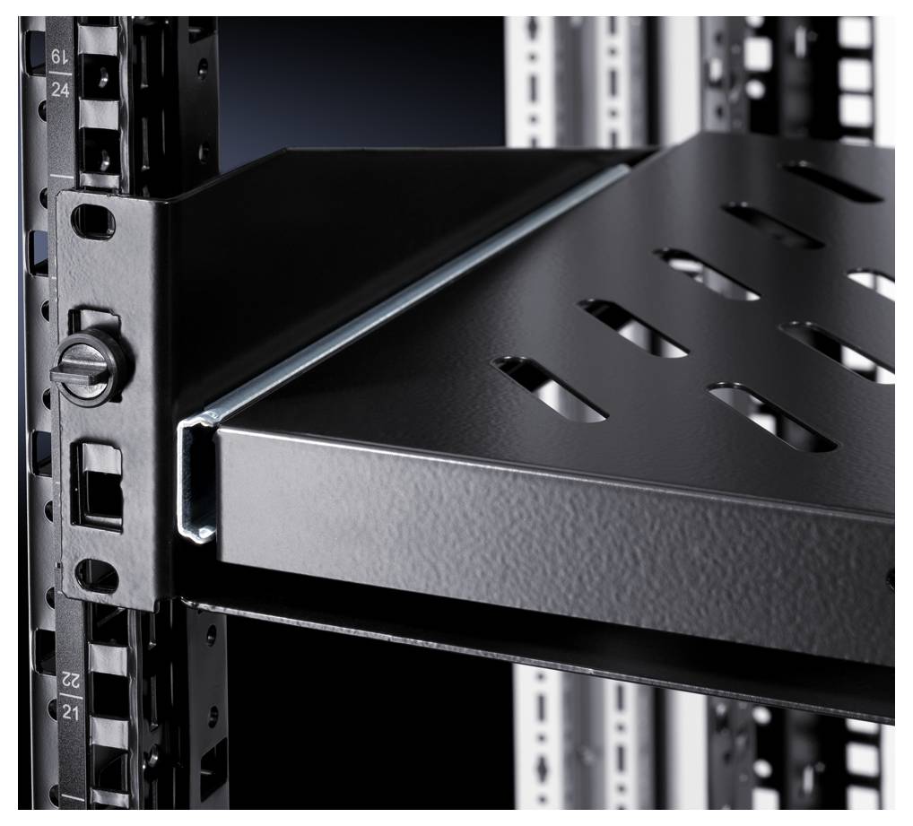 A black metal shelving unit with perforations is mounted in a server rack. It demonstrates robust construction for IT equipment.