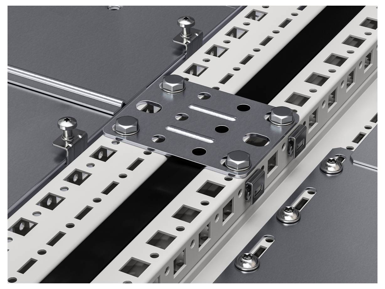 Metal structural connection with bolts on rectangular mounting brackets, showing precise mechanical construction in an industrial environment.