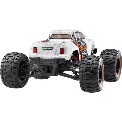 A remote-controlled car with distinctive off-road tyres, a black front axle, and a pattern of white and black spots.