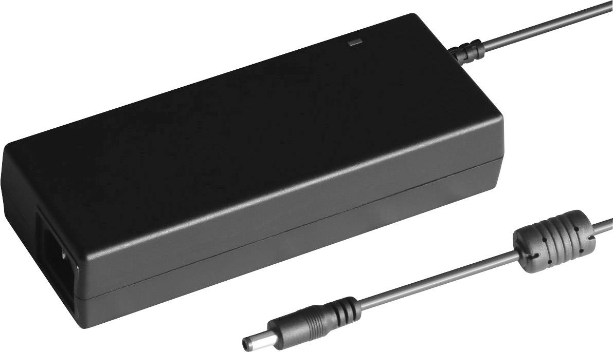 Black laptop power adapter with a detachable cable and circular connector, lying on a surface.