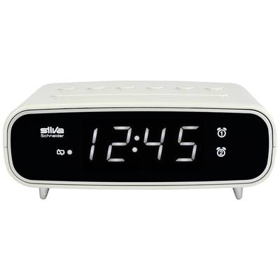 A white digital alarm clock displays the time '12:45'. The alarm clock has alarm functions and buttons on top.