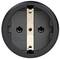 Close-up of a black, round wall socket with visible metal contacts. Suitable for mains voltages up to 250 volts.