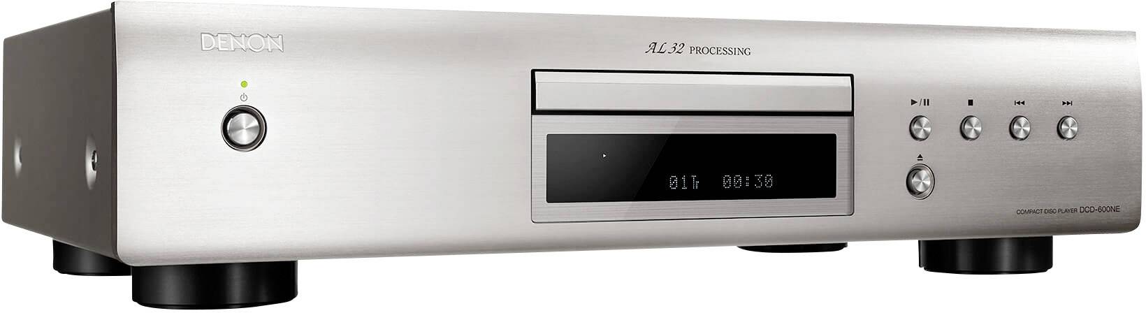 Silver audio player with digital display and control buttons. Device stands on black feet and shows time and functions.