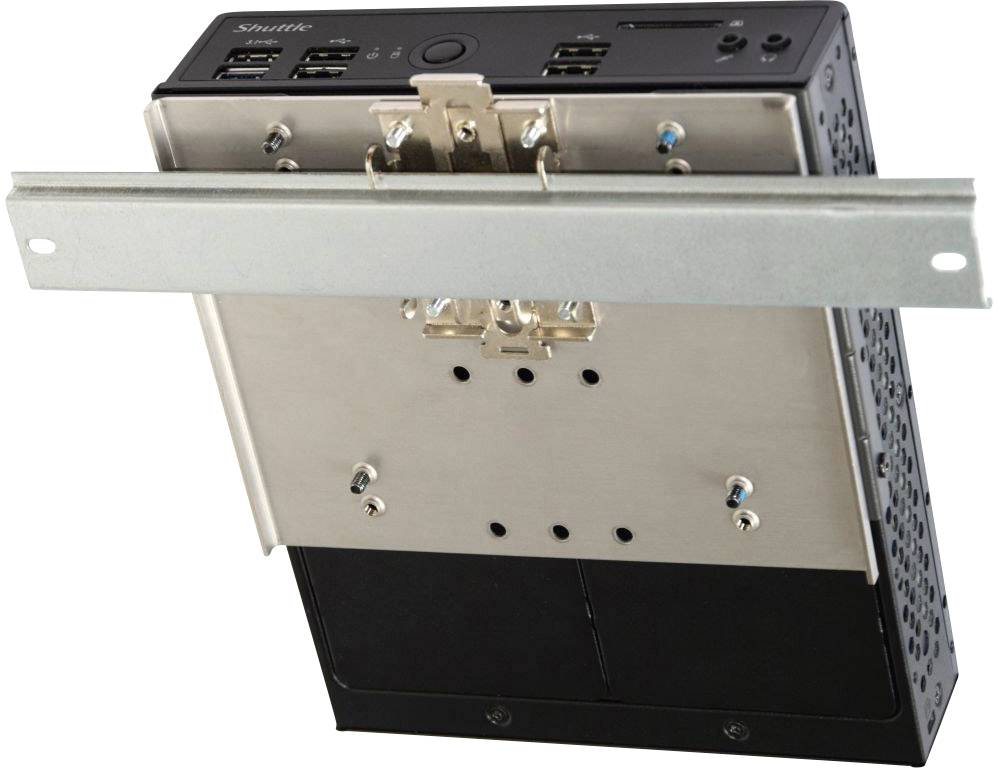 Small black computer with multiple USB ports and a metal rail for wall mounting.