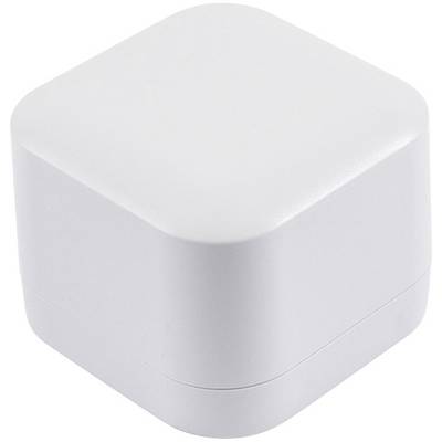 A white, cube-shaped object with rounded corners, possibly a small technical device or accessory.