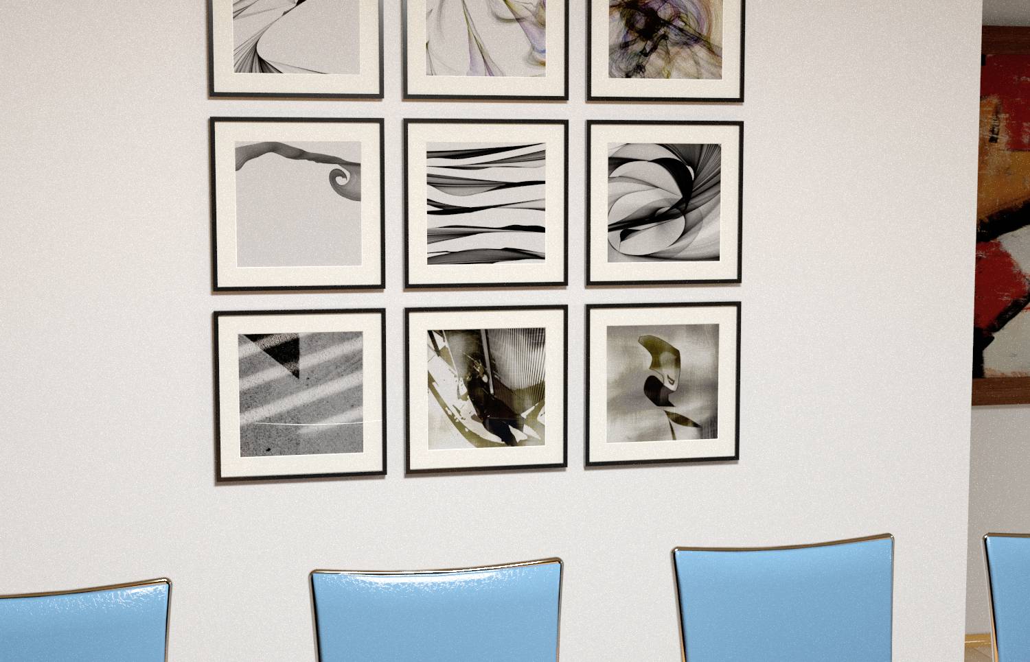 Wall with nine abstract artworks in black frames above three light blue chairs.