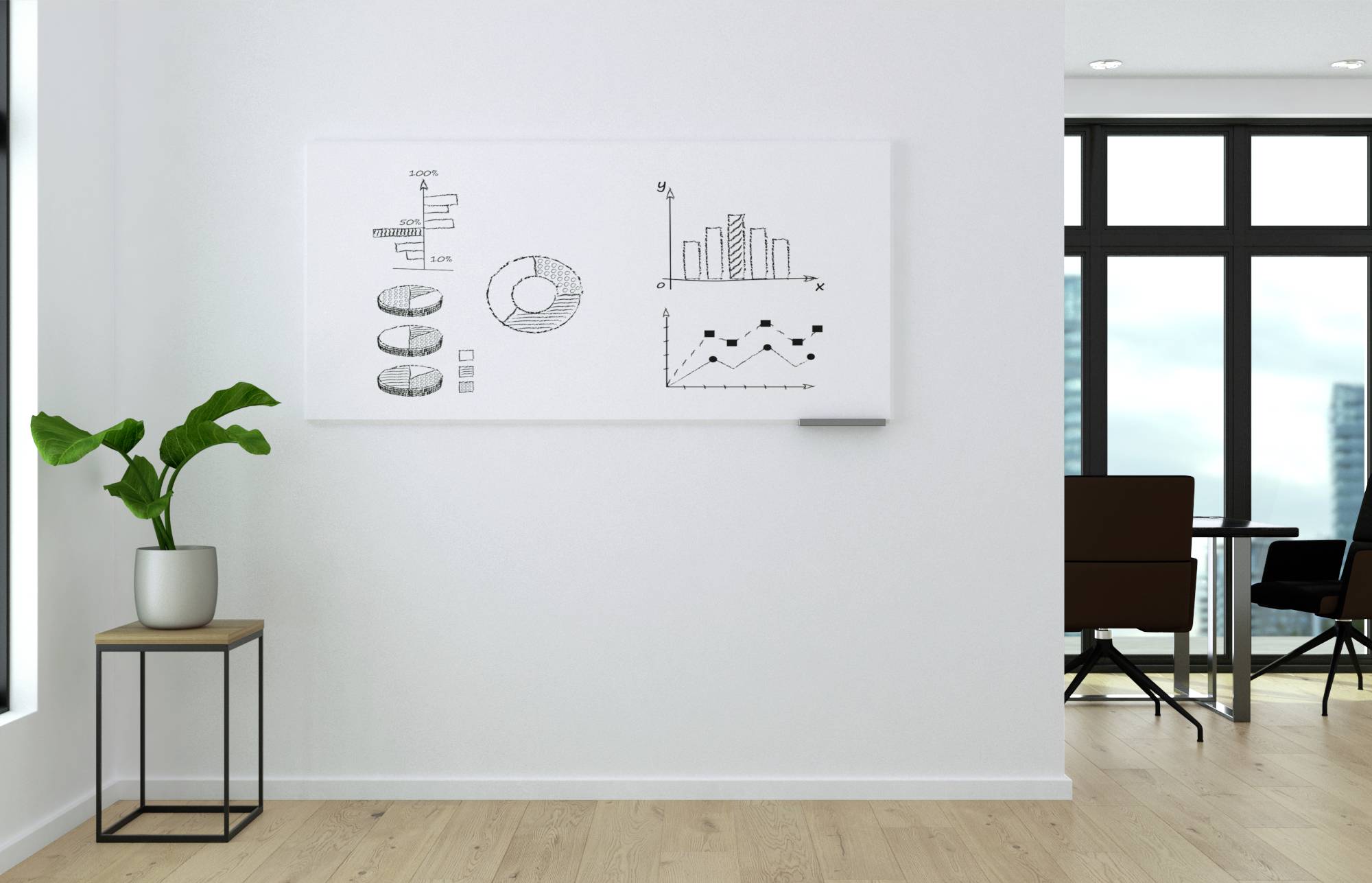 A modern office with a wooden floor. On the left, a plant sits on a table. A whiteboard with diagrams and charts is mounted on the wall.