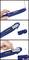 A hand is holding a blue cutting tool with a replaceable blade. It demonstrates how the blade is removed and replaced, with a screw positioned nearby.