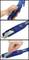 'Three images of a blue safety knife. First image shows knife in hand, arrows explain operation. Second image shows blade in close-up. Third image shows hand retracting the blade.'