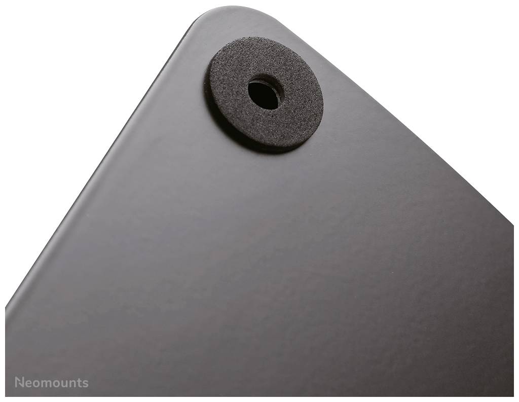 Corner of a black plate with a round hole and neoprene edge, marked with 'Neomounts'.