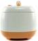 Modern rice cooker, white and orange, with rounded corners and a smooth surface. Perfect for kitchens with a stylish design.