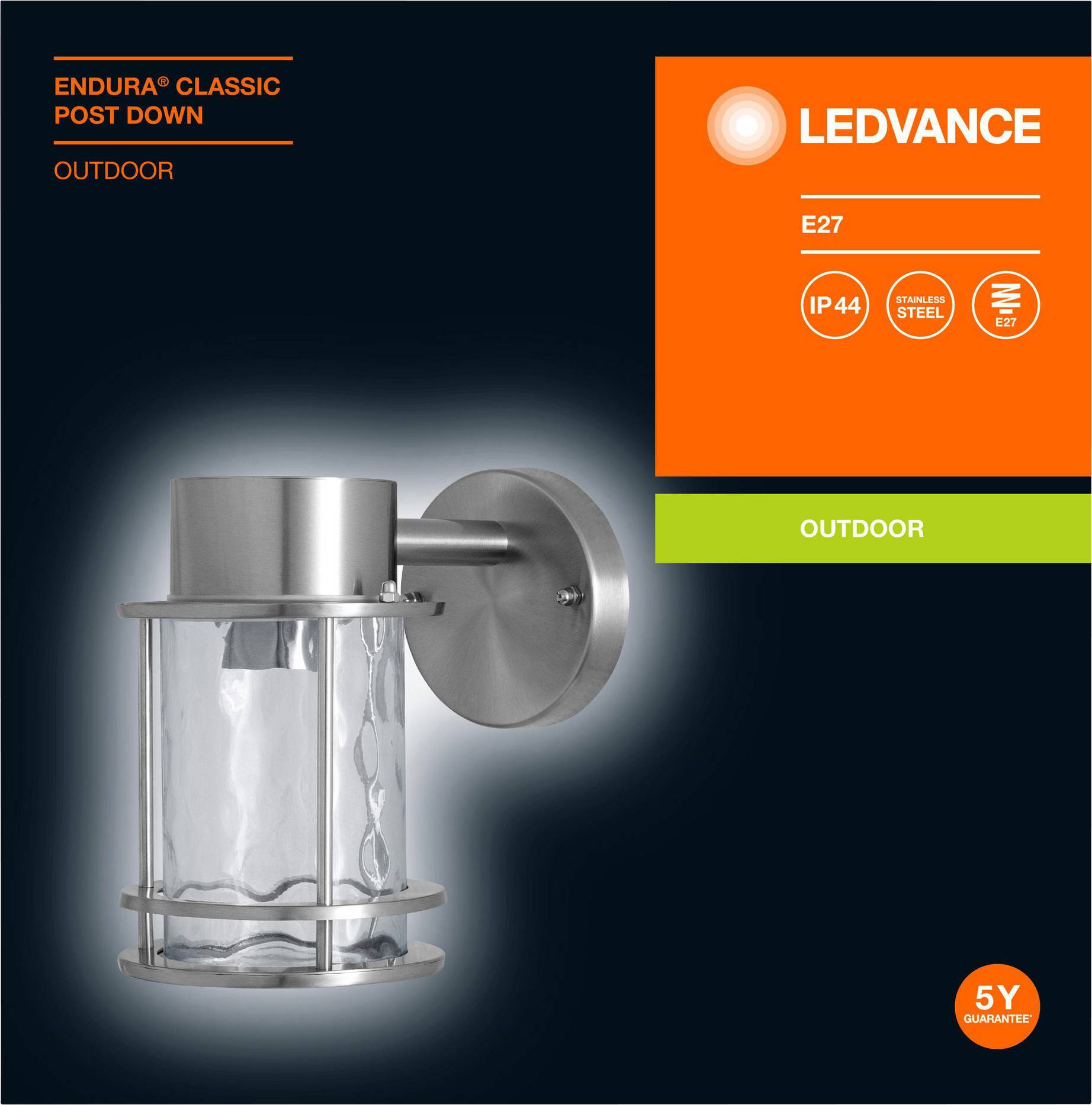 Silver exterior wall light with cylindrical glass. Brand name and technical specifications on the right: IP44, stainless steel, LED, E27, 5-year guarantee.