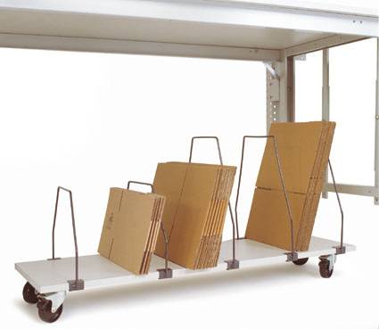 A mobile cardboard box holder with wheels underneath a shelf. Boxes of various sizes are stored in separate compartments.