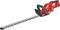 Red electric hedge trimmer with long cutting blade and black handle, suitable for trimming hedges and bushes in the garden.