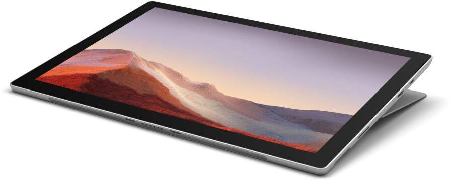 A slim, silver laptop with a display showing a landscape of red mountains at sunset.