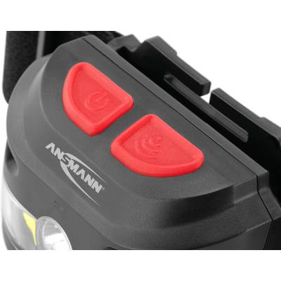 Portable light with two red buttons for on/off and signal, 'Ansmann' brand name visible. Ideal for versatile lighting situations.