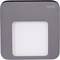 Square wall light with a grey frame and a white, illuminated centre, suitable for modern interiors.