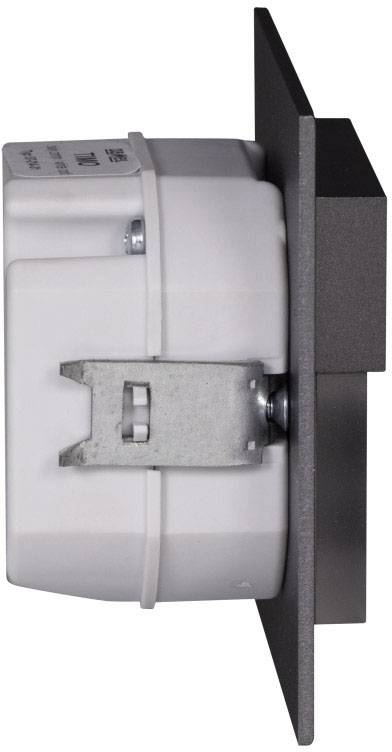 Side view of a white wall switch with a grey frame. The switch is mounted on a metal mounting bracket.