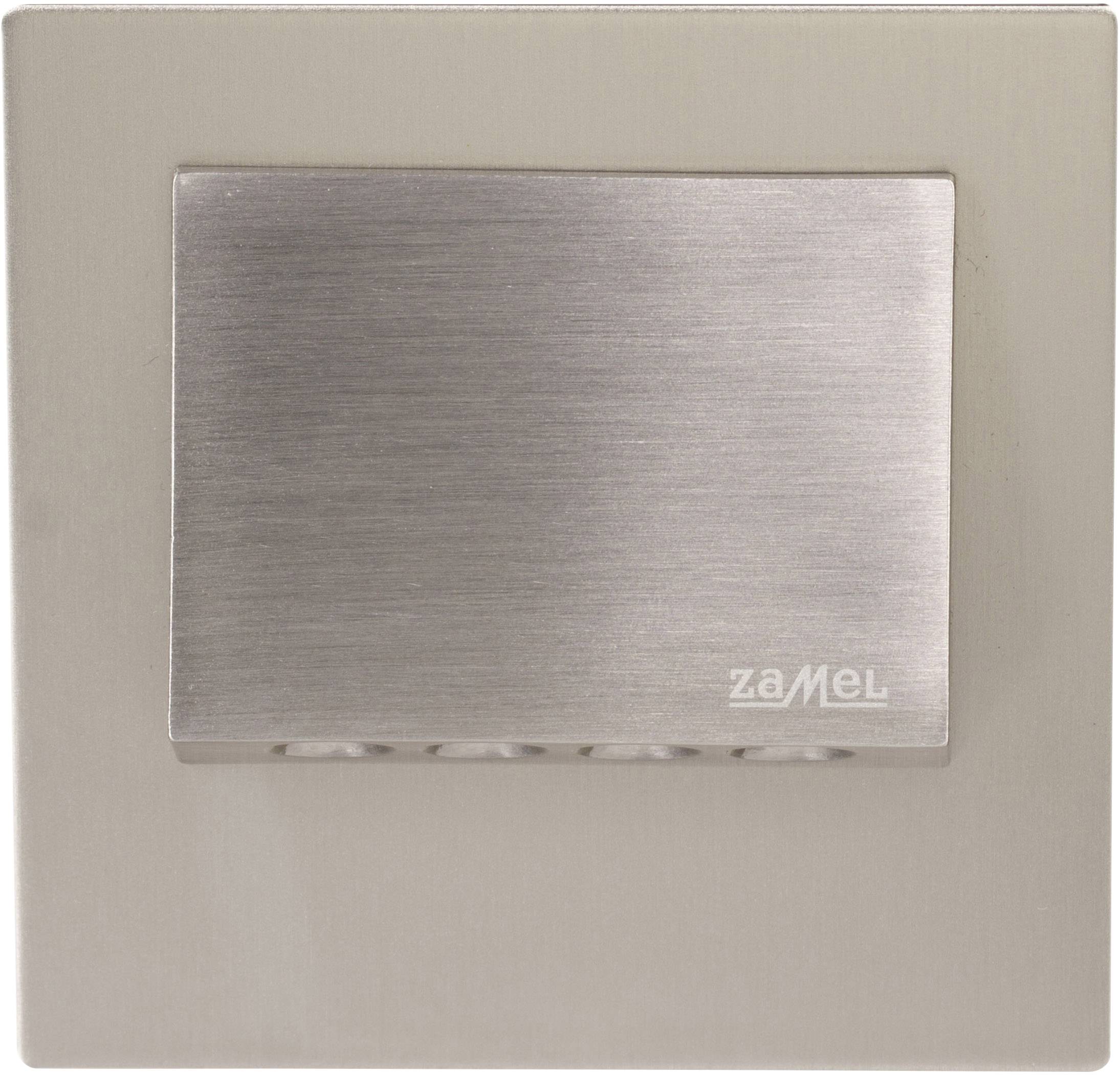 A square light switch made of brushed metal with the inscription 'zaMel' in the bottom right corner.
