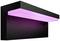 Black rectangular wall light with glowing pink light directed downwards. Modern design, suitable for decorative interior lighting.