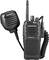 A Kenwood two-way radio with microphone, suitable for communication in challenging environments, featuring ProTalk digital labelling.