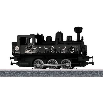A historical, black-drawn toy train with Halloween-themed decorations such as ghosts and pumpkins on the side of the carriage.