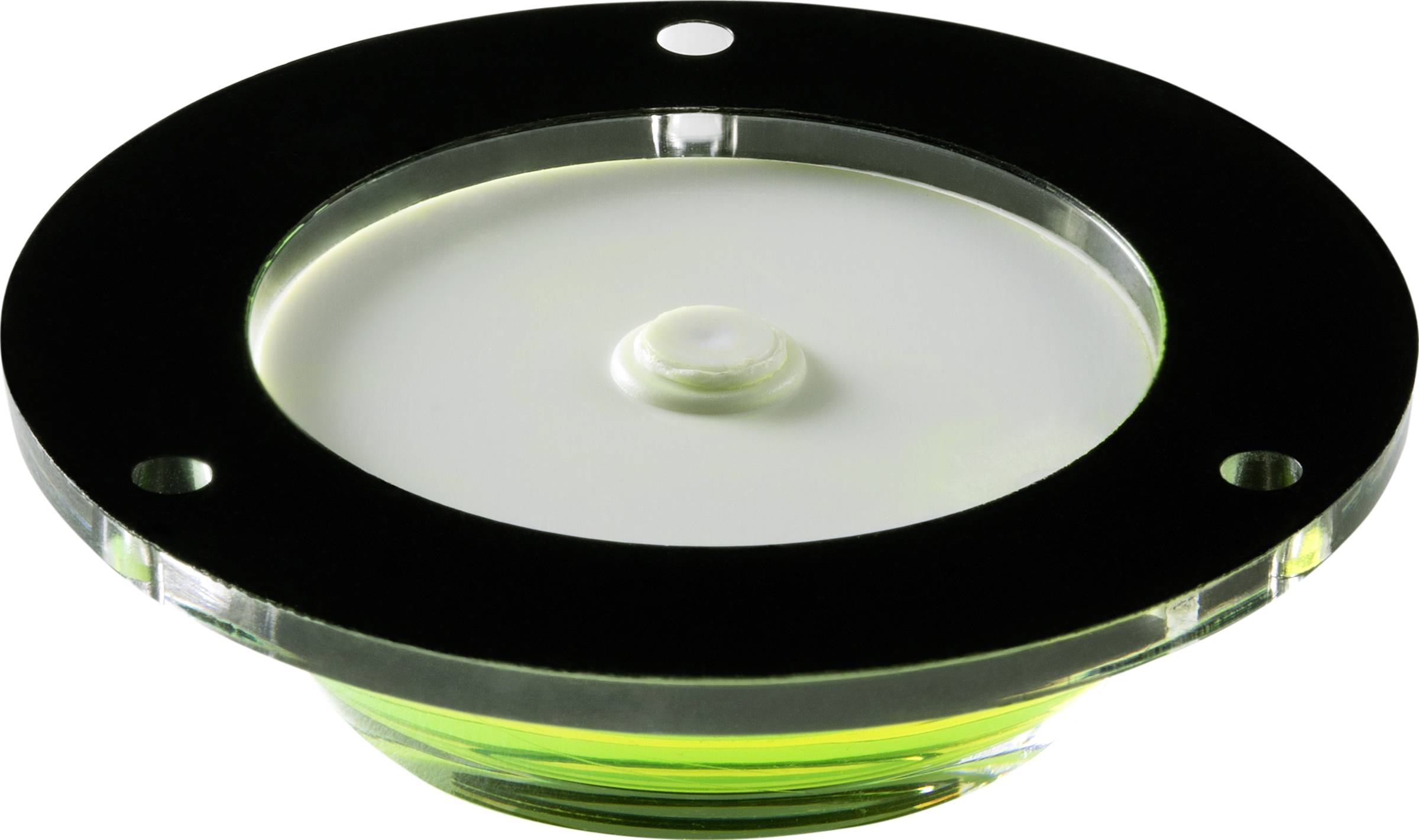 A round, flat object with a black border and a small, raised dot in the centre on a white, flat surface.