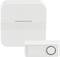 A white wireless doorbell set with receiver and transmitter. The receiver has a decorative pattern, and the transmitter has a round button.