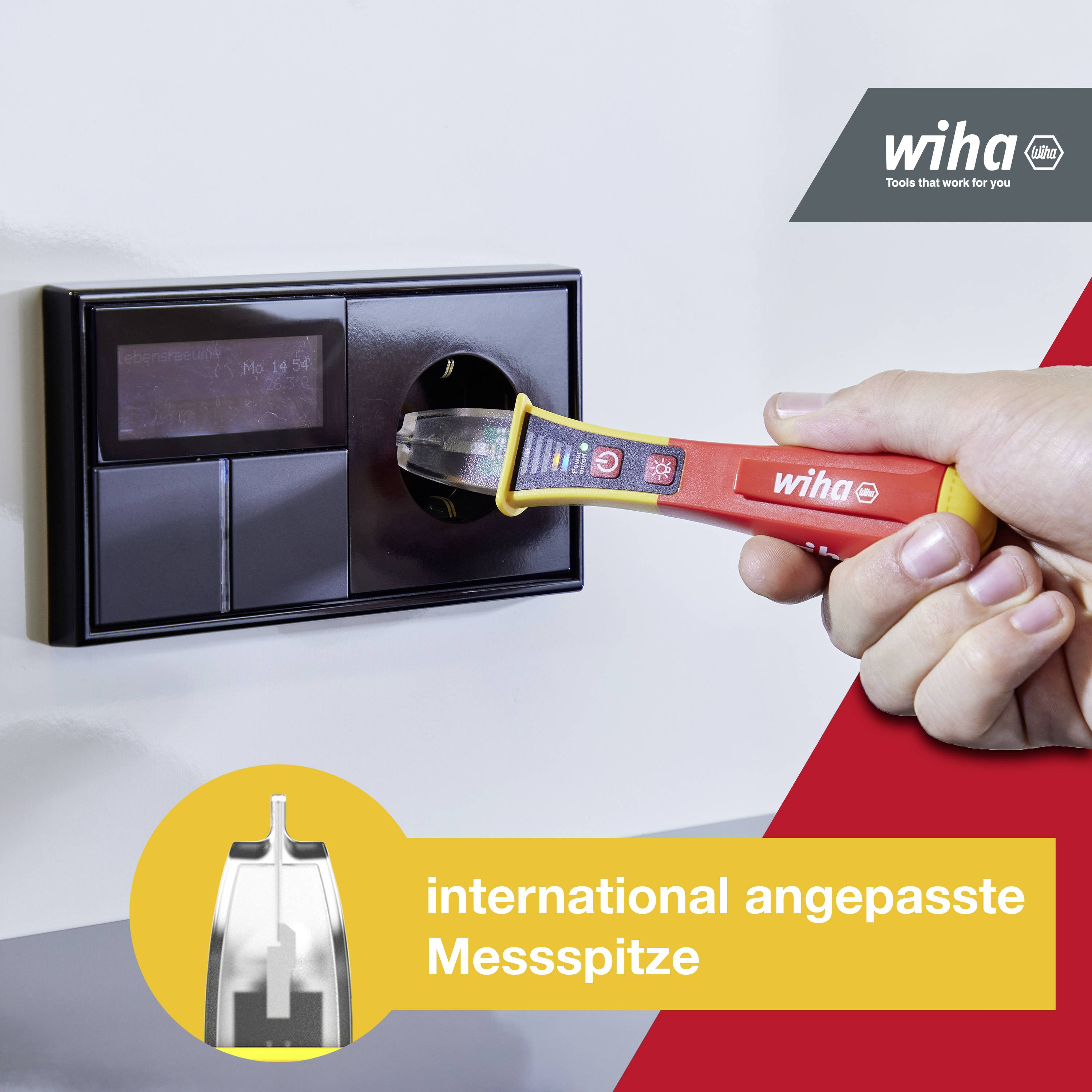 A screwdriver is held against a wall socket. Text: 'internationally adapted measuring tip'. Top right: wiha logo.
