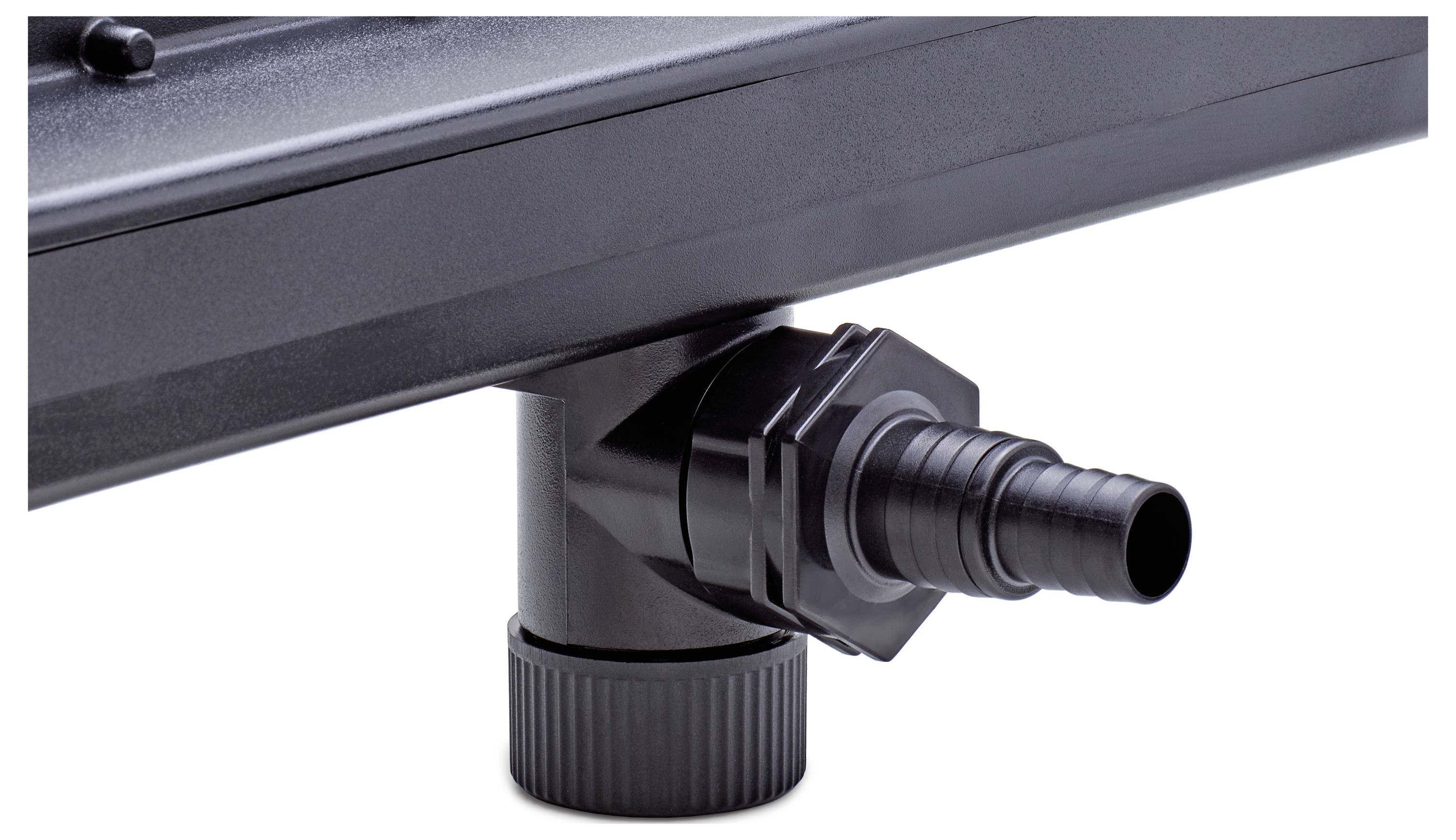 A black plastic elbow connector attached to a pipe system, designed for fluid transfer, features ridged edges and a threaded bottom.