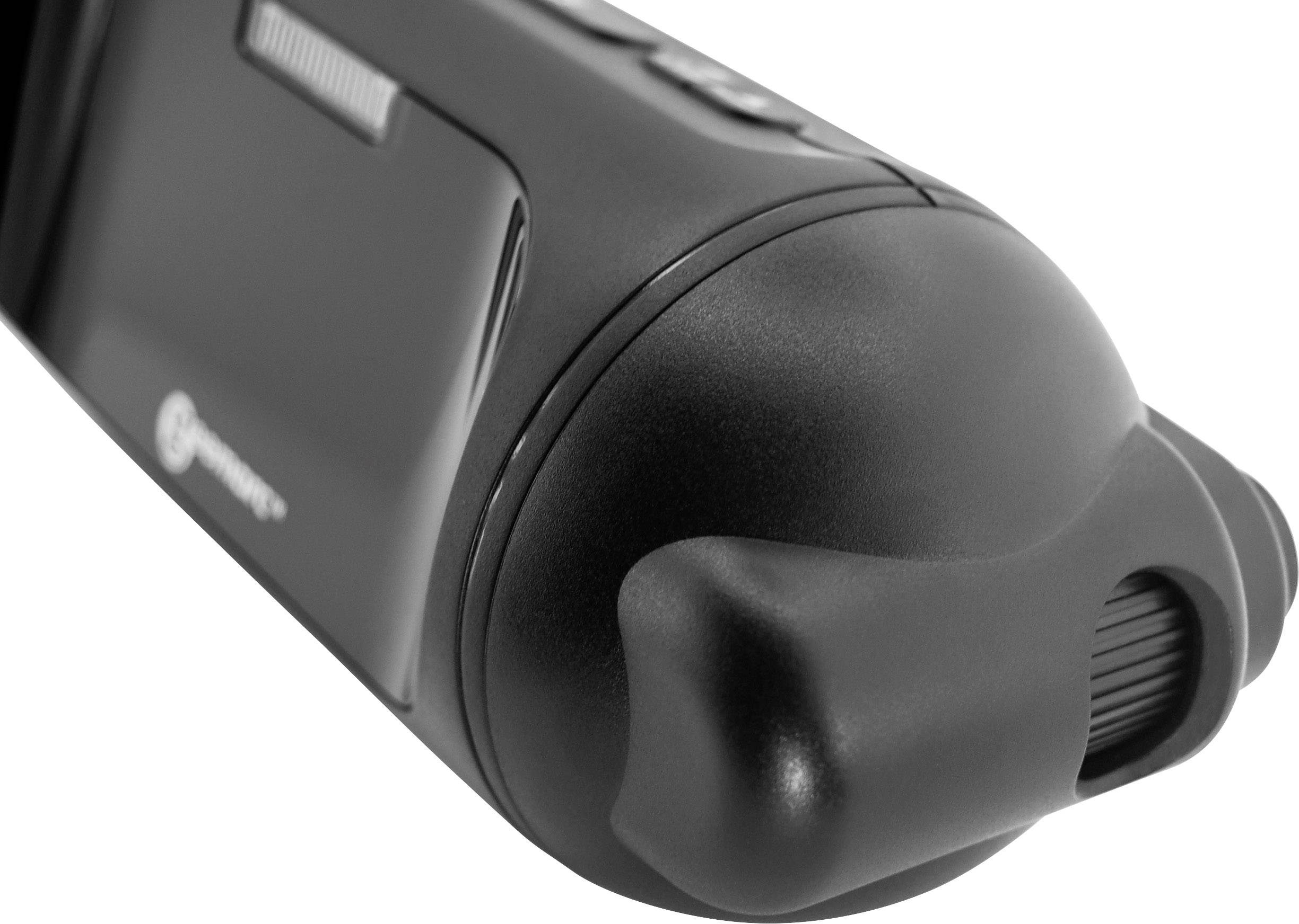 A black automotive component with curved forms, likely a rear light or bumper, with a smooth surface and subtle reflection.