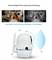 Camera with automatic night vision and motion tracking. Pan range 355°, tilt range 120°. Image of dog during day and night.