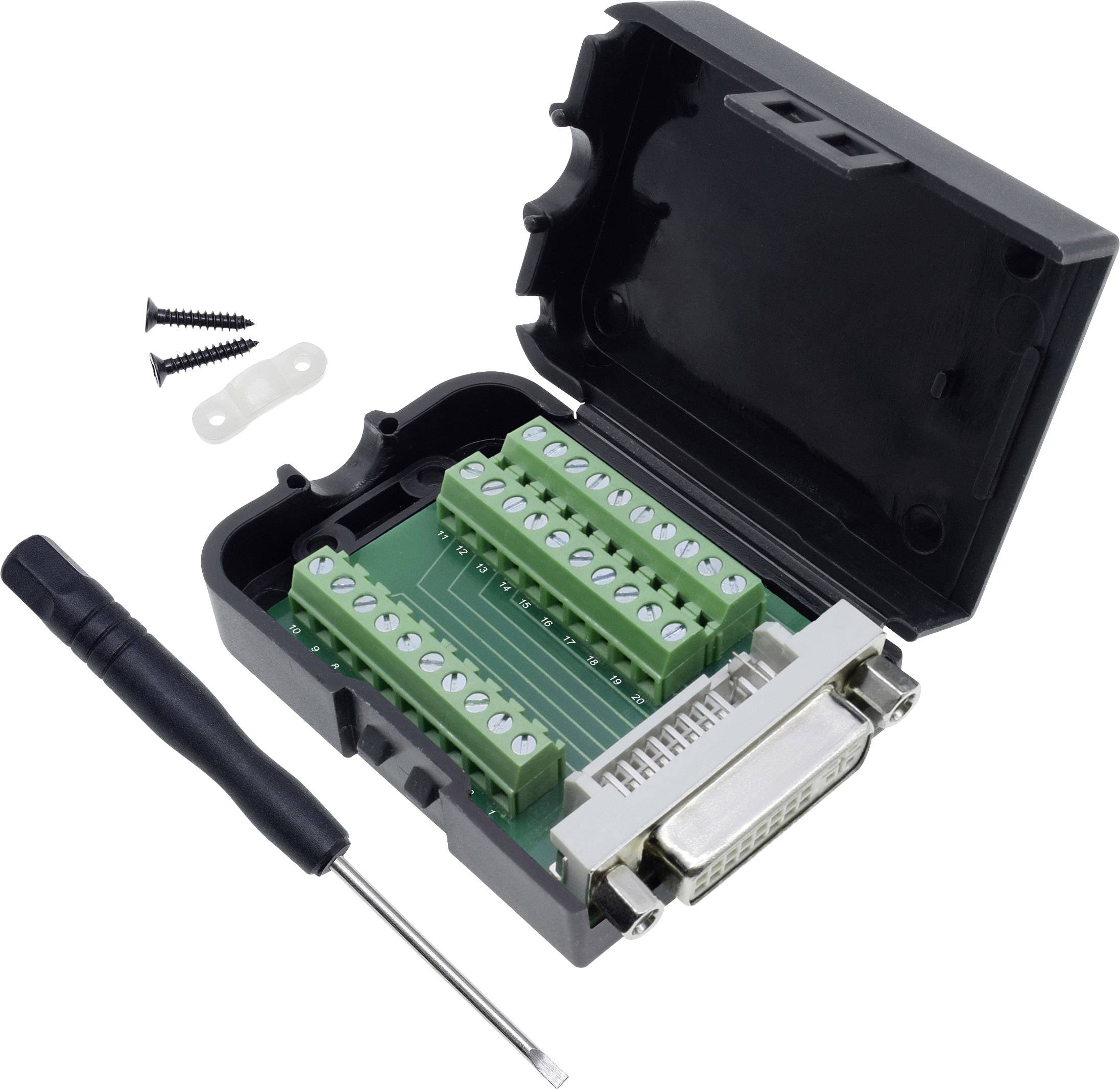 An opened electrical connection module with multiple terminals, screws, and a small screwdriver beside it.