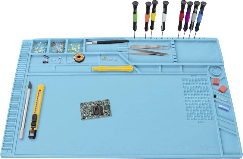 Electronic repair mat with various tools such as screwdrivers, tweezers and an electronic component in the centre.