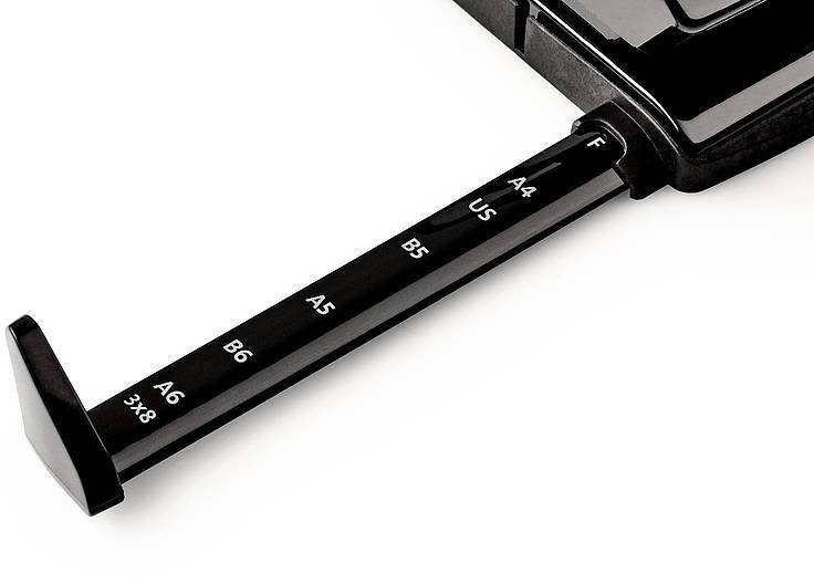 A paper slide lever indicates common paper sizes such as A4, A5, B5 and US, likely part of a printer or copier for setting the paper size.