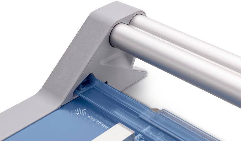 Paper cutting machine with a blue cutting surface and silver cutting blades. Markings for maximum cutting depth are visible.