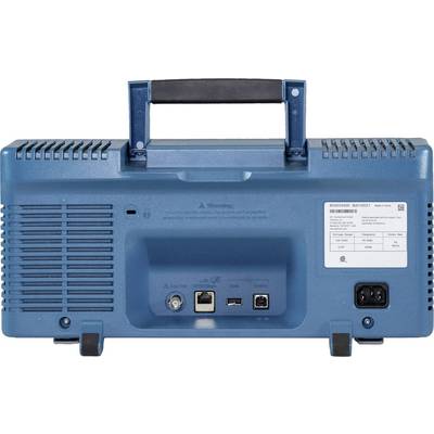 Portable blue electronic device with a carrying handle, ventilation slots, ports, and a label with technical specifications on the back.