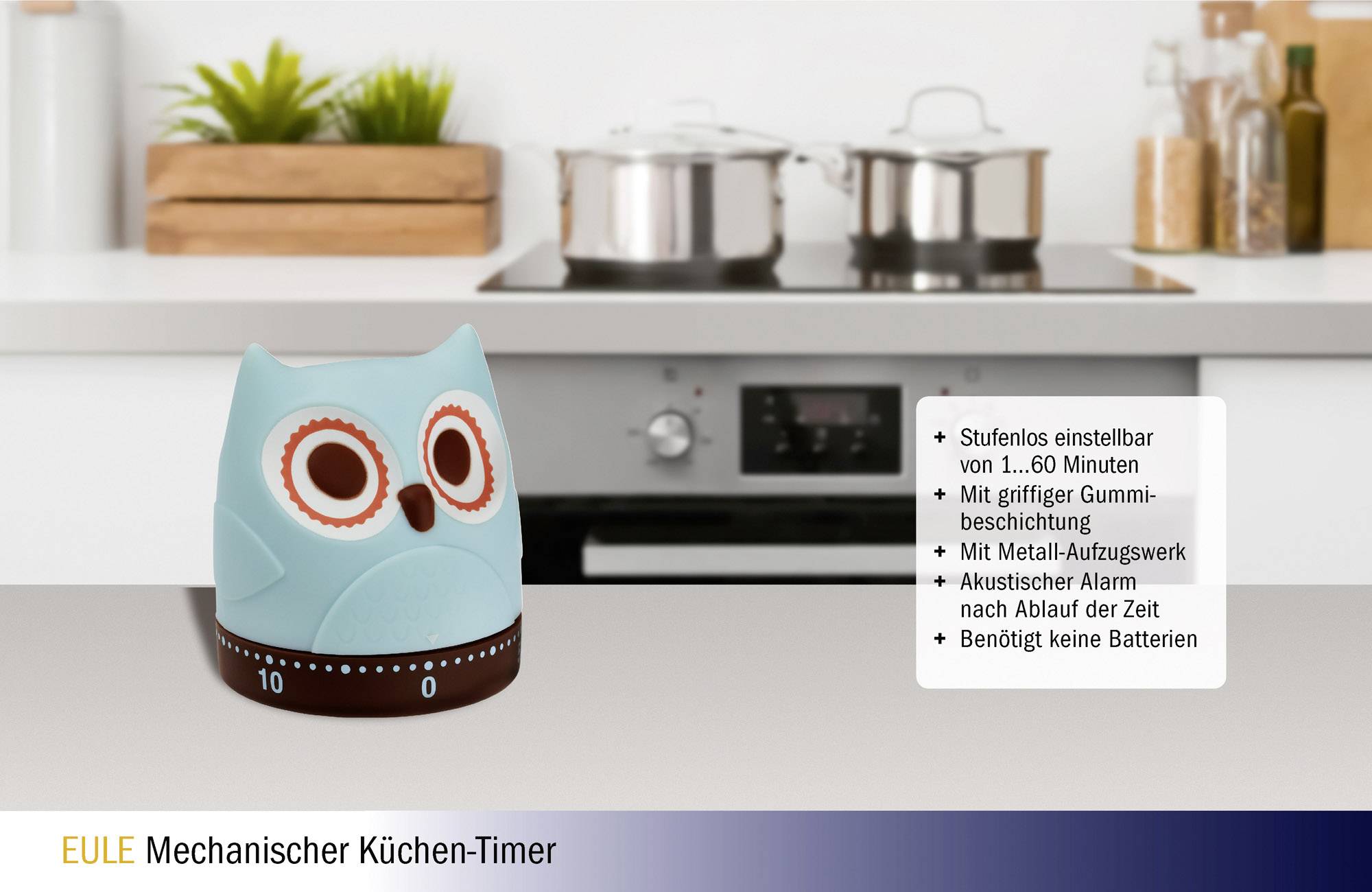 Mechanical kitchen timer in owl shape on a worktop. Adjustable from 1-60 minutes with acoustic alarm. No batteries required.