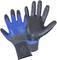 Two protective gloves, one showing the blue palm, the other the black upper side. Suitable for workplace safety.